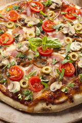 Pizza with ham and mushrooms