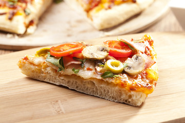 Pizza with ham and mushrooms