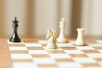 moving chess pieces on chessboard