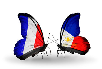 Two butterflies with flags France and Philippines