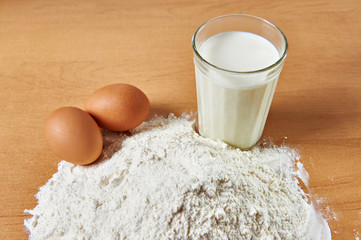 Still life of flour, milk and eggs