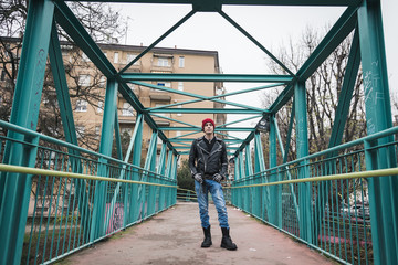 Punk guy posing in the city streets