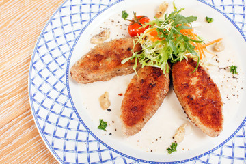 Cutlets with salad