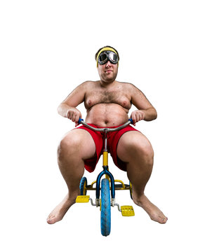Man riding a small bicycle