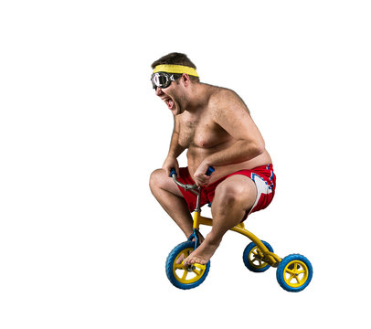 Fat man riding a small bicycle