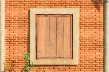 Old wood window and brick wall background