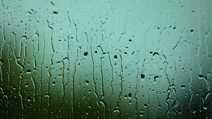 Closeup of water drops on glass as background