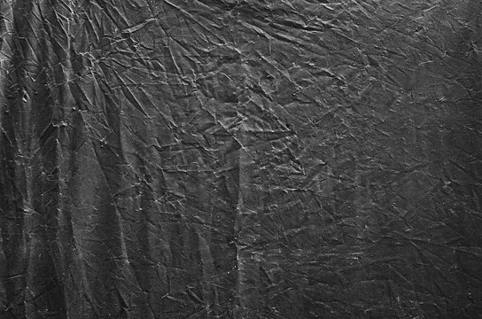 Black plastic sheet texture background