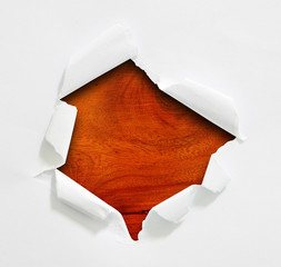Hole ripped in paper