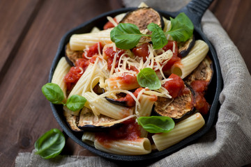 Pasta alla Norma. Italian dish with eggplant and tomato