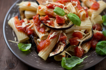 Traditional italian pasta alla Norma, horizontal shot, close-up