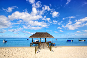 Jetty and boats at Mauritius beach