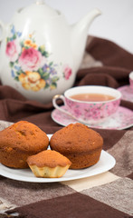 Fototapeta na wymiar Muffins and tea
