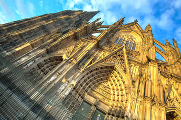 Facade of the Dom church in the city Cologne with blue sky