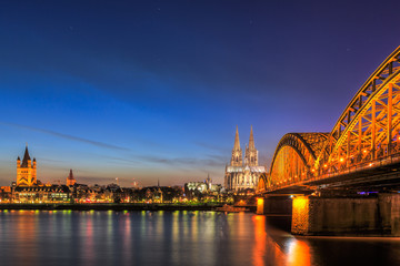 Cityscape of Cologne from the Rhine river at night