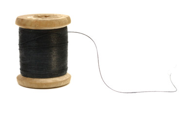 wooden spool of black thread