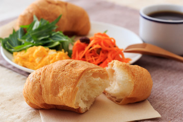 Bread and coffee with salad for Breakfast