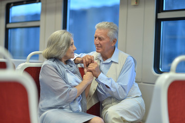 Fototapeta premium Senior couple in train