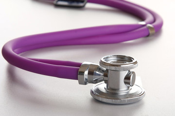 Closeup of a medical stethoscope, isolated on white