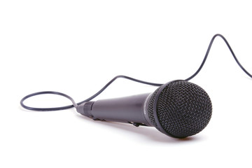 An image of a microphone isolated on white background