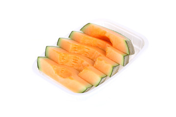 cantaloupe melon slice isolated on white background