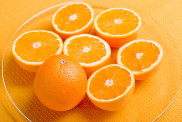sliced ripe appetizing orange to yellow napkin
