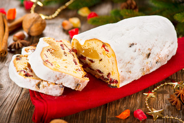 Christmas Stollen. Traditional Sweet Fruit Loaf with Icing Sugar
