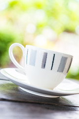 Coffee cup on wooden table
