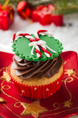 cupcake with Christmas cane candy