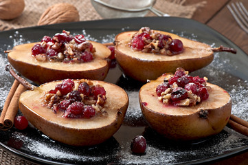 Baked pears with cranberries, honey and walnuts