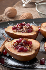 Baked pears with cranberries, honey and walnuts