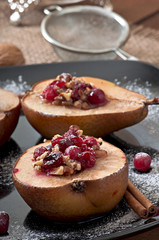 Baked pears with cranberries, honey and walnuts