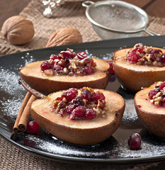 Baked pears with cranberries, honey and walnuts