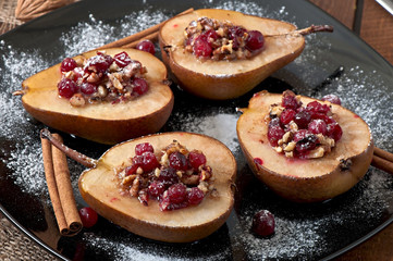 Baked pears with cranberries, honey and walnuts