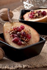 Baked pears with cranberries, honey and walnuts