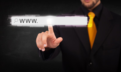 Young businessman touching web browser address bar with www sign