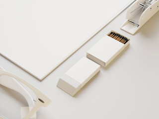 White box of matches and other branding on white paper backgroun