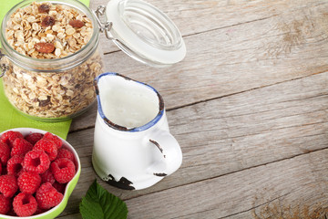 Healty breakfast with muesli, berries and milk