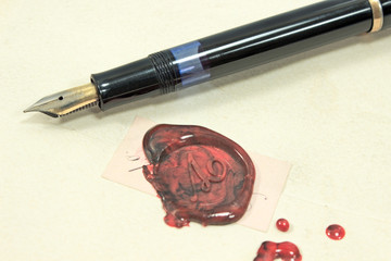 Fountain pen and wax sealed letter