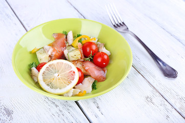 Fresh fish salad with vegetables