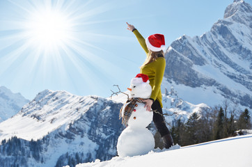 Girl with a snowman