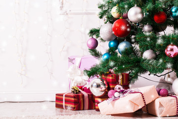 Christmas tree with gifts and stars