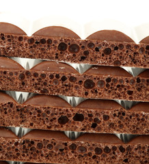 Tasty porous chocolate with empty white background