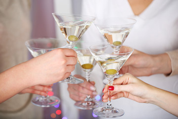 Woman hands with glasses of champagne