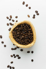 Coffee beans in a rustic bowl