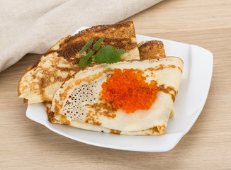 Pancakes with red caviar