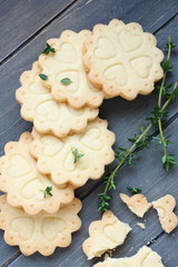 Homemade gluten free shortbread cookies with branches of thyme