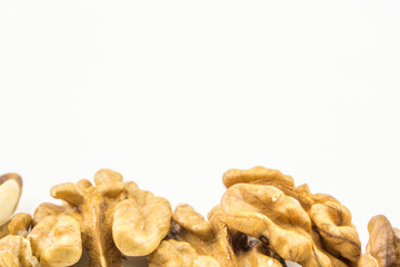 whole walnuts on white backround