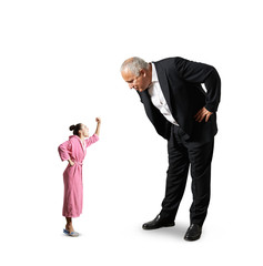 man looking at small screaming woman