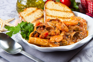 fish soup with grilled polenta